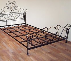 Кованая кровать для дома