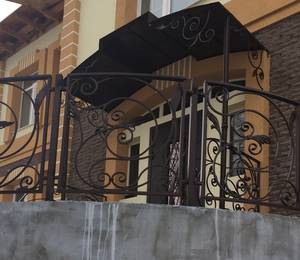 Фото кованого балкона